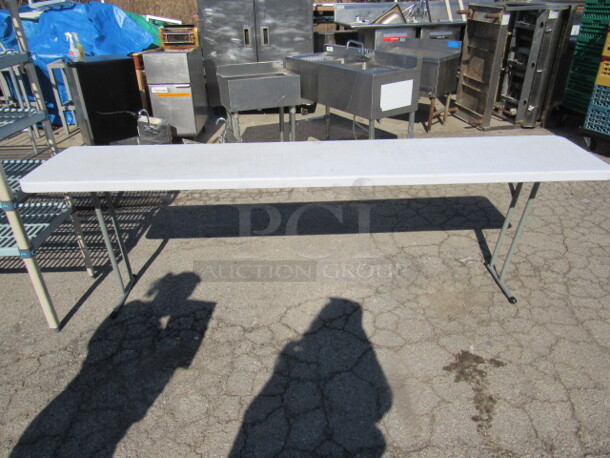 One 95X18X29.5 Folding Table. Looks NEW!