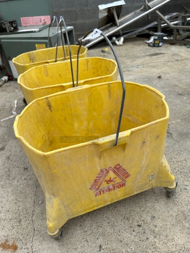One Mop Bucket On Casters. - Image 1 of 1