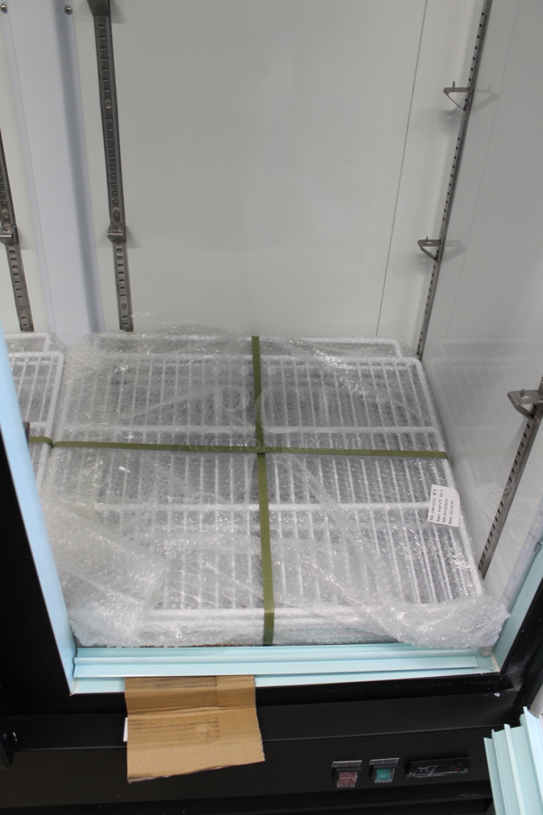 BRAND NEW SCRATCH AND DENT! Avantco 178GDC40HCB Avantco 178GDC40HCB Metal Commercial 2 Door Reach In Cooler Merchandiser w/ LED Lighting on Commercial Casters. 115 Volts, 1 Phase. Tested and Working!
 - Image 6 of 8