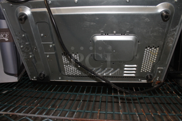 2011 Panasonic NE-1024F Stainless Steel Commercial Countertop Microwave Oven. 120 Volts, 1 Phase.  - Image 7 of 8