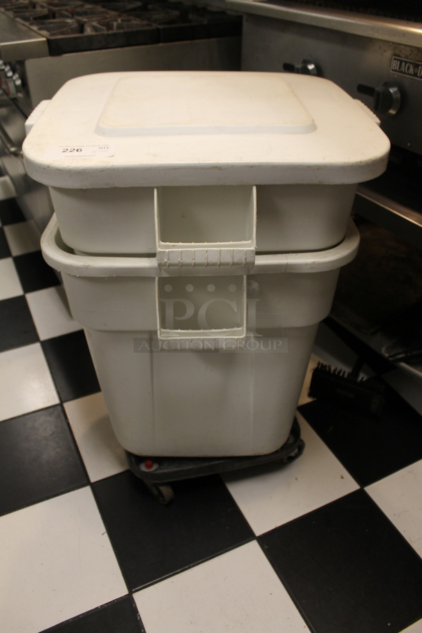 2 White Poly Trash Cans w/ 2 Lids and 1 Dolly. 2 Times Your Bid! (kitchen) - Image 1 of 4