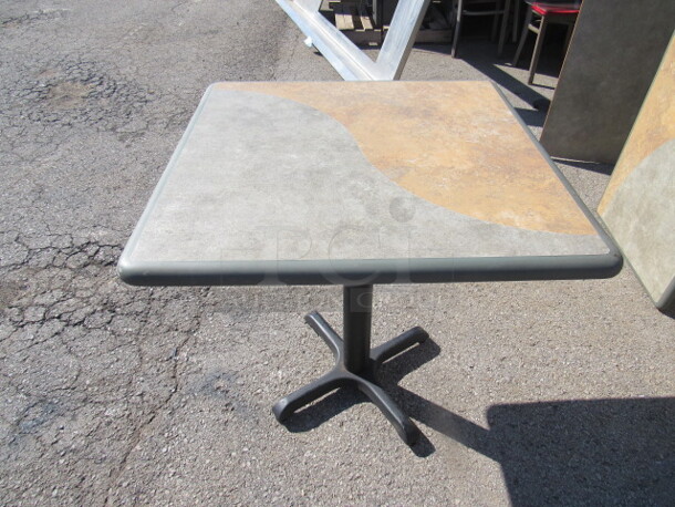 One Green/Brown Laminate Table Top On A Pedestal Base. 30X30X30