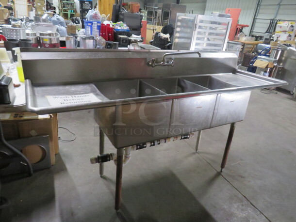 One Stainless Steel Triple Bowl Sink With Faucet And R/L Drain Boards. 84X27X43.5 - Image 1 of 2