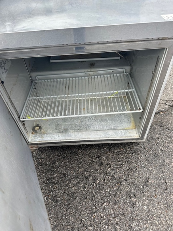 One WORKING Delfield SS 1 Door Under Counter Refrigerator With 2 Racks On Casters. Model# GUR32P-S-10. 115 Volt. 32X32X33.5 - Image 2 of 2