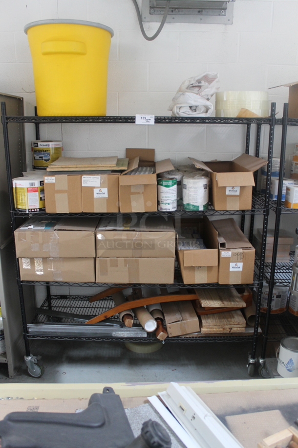 Black 4 Tier Wire Shelving Unit w/ Contents Including Labels on Commercial Casters. BUYER MUST REMOVE. - Image 1 of 7