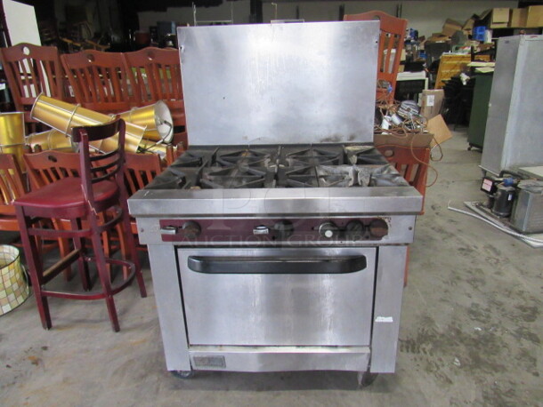 One Southbend Natural Gas 6 Burner Range On Casters. Model# X436D. 36.5X33.5X59.