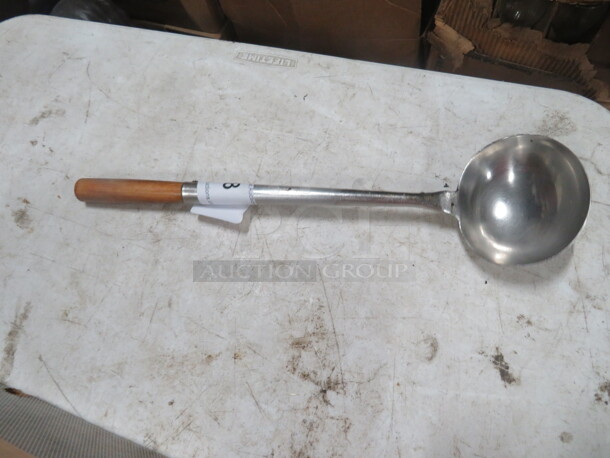 One Wooden Handle Spoon. - Image 1 of 1