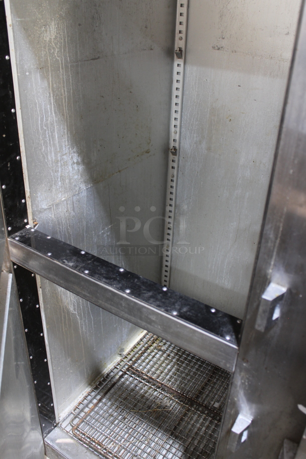 Traulsen Stainless Steel Commercial 6 Half Size Door Reach In Cooler on Commercial Casters. 115 Volts, 1 Phase. Tested and Powers On But Does Not Get Cold - Image 5 of 8