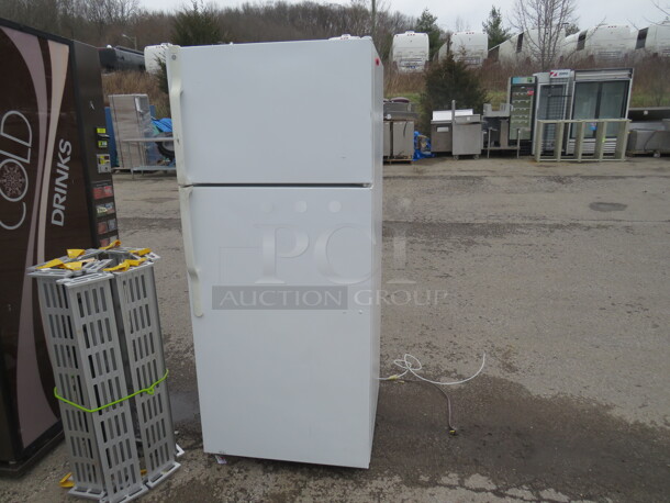 One GE Refrigerator/Freezer. 110 Volt. Model# GTH18HCTRRWW. 28X30X66.5 - Image 1 of 3