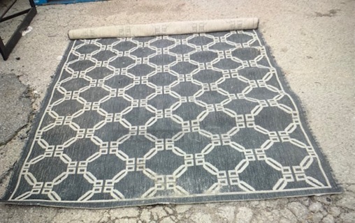 One 83X63 Black Rug.