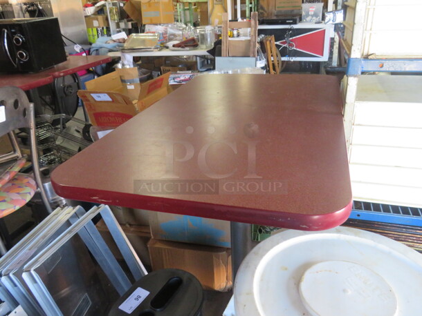 One Laminate Table Top On A Bar Height Pedestal Base. 42X24X42 - Image 1 of 2
