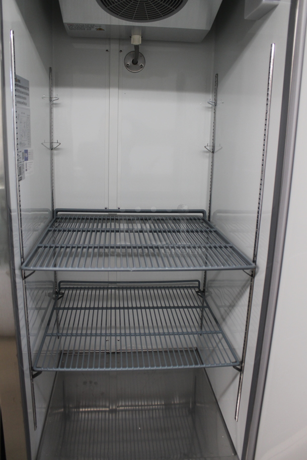 BRAND NEW SCRATCH AND DENT! 2023 Avantco 178A23RHC Stainless Steel Commercial Single Door Reach In Cooler w/ Poly Coated Racks on Commercial Casters. 115 Volts, 1 Phase. Tested and Working! - Image 5 of 6
