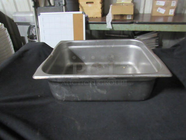 One Half Size 4 Inch Deep Hotel Pan With Lid. 
