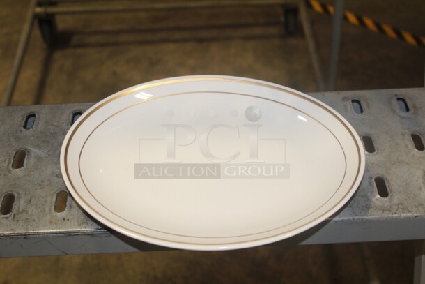 NEW IN BOX! 2 Boxes (24 Count Each) Homer Laughlin 11x9" Gold Trimmed Platters. 48X Your Bid!  - Image 1 of 2