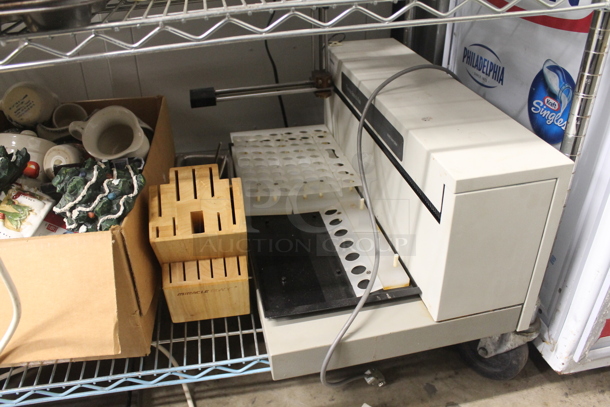 ALL ONE MONEY! Lot of Strainers, Stainless Steel Masher, Steel Drop In Bins, Hand Mixers, Small Steel Pot, Cuisinart Food Processor, Muffin Baking Sheets, Coffee Maker, Heart Shaped Wicker Basket, Salt And Pepper Shakers, Christmas Decorations, 2 Boxes Of NEC SP-32 Speakers AND MORE! Does Not Include Metro Shelf. - Image 11 of 12