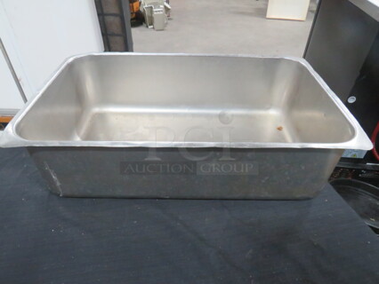 One Full Size 6 Inch Deep Hotel Pan.