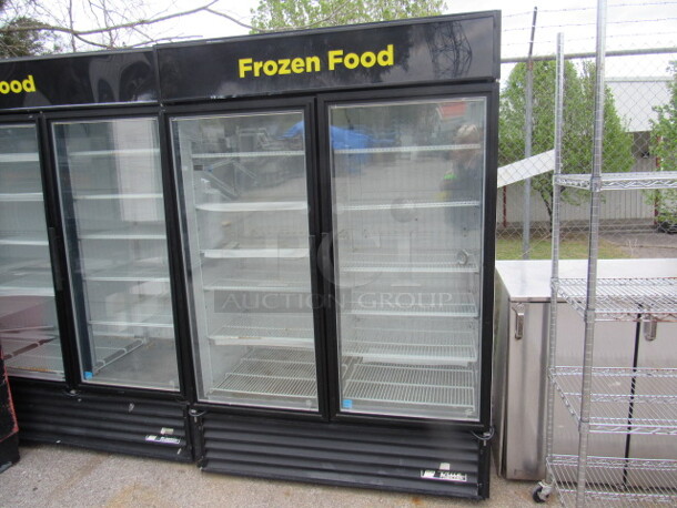 One 2 Door True Freezer With 12 Racks. 115/208-230 Volt. 1 Phase. Model# GDM-49FLD. Working When Removed. 