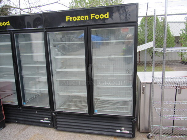 One 2 Door True Freezer With 12 Racks. 115/208-230 Volt. 1 Phase. Model# GDM-49FLD. Working When Removed.  - Image 1 of 1