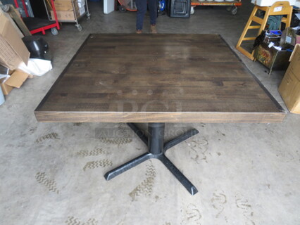 One Wooden Look Laminate Table Top On A Pedestal Base. 36X36X30.