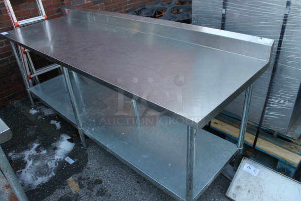 Stainless Steel Table w/ Back Splash and Under Shelf. - Image 1 of 4