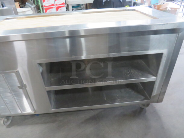 One Delfield Stainless Steel Serving Table With A 50X20X6 Well, And 2 Stainless Under Shelves, On Casters. 63X30X36  - Image 3 of 5