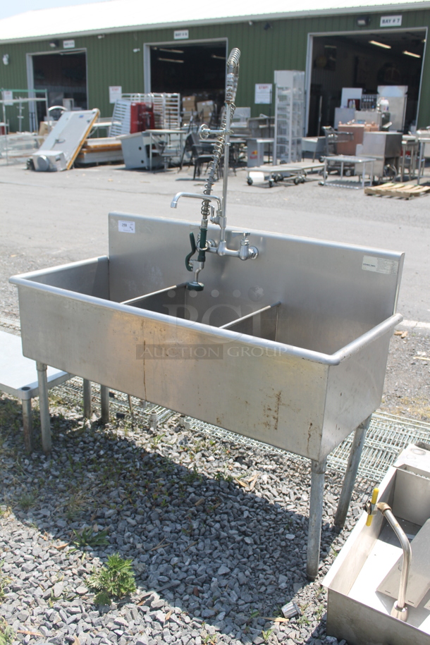 Advance Tabco 6-3-54 Commercial Stainless Steel 3 Bay Sink With Gooseneck Faucet And Pre-Rinse Faucet On Galvanized Legs.