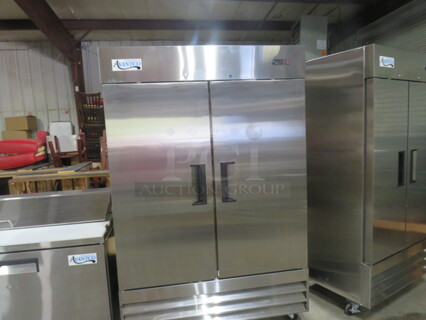 One WORKING 2 Door Avantco Freezer With 6 Racks, On Casters. Model# 178A49FHC. 54X32X83