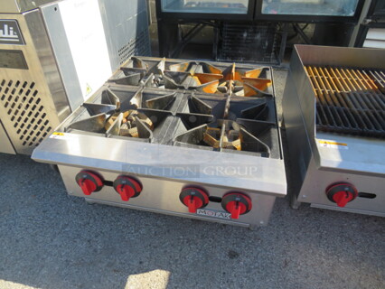 One Motak Propane  Table Top 4 Burner. Model# MHP-24.  24X28X13