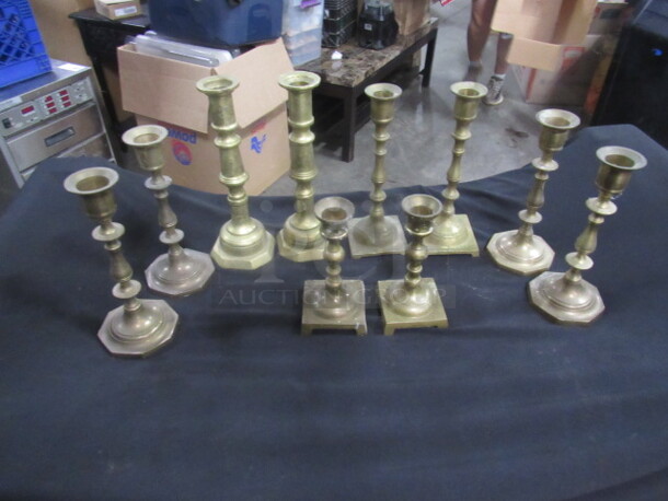 One Lot Of 10 Brass Candle Holders.