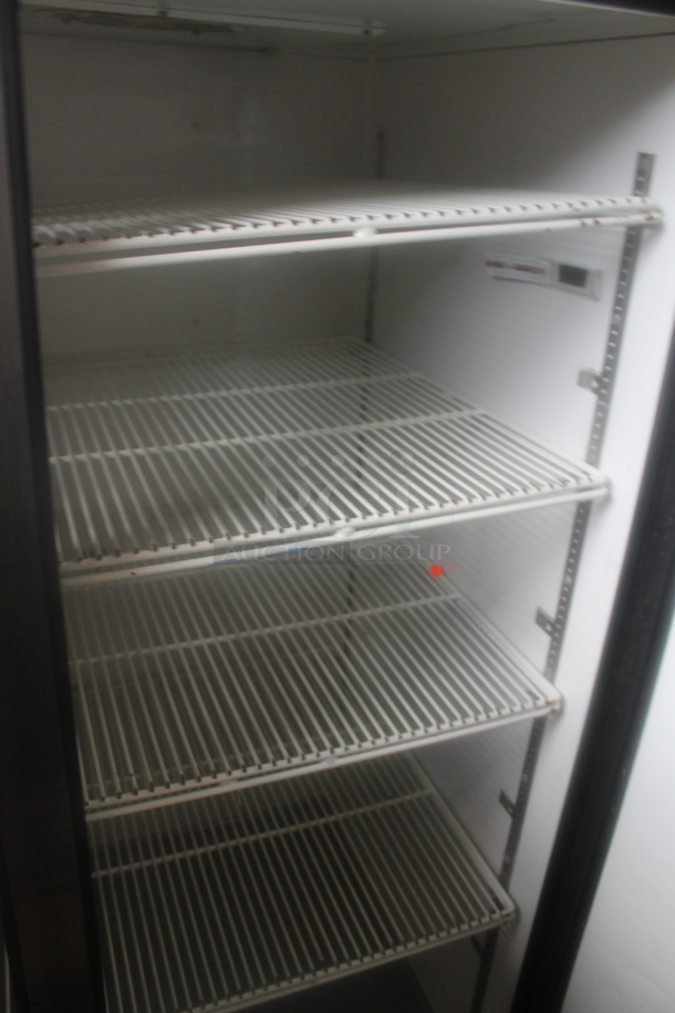 2014 True TG2R-2S ENERGY STAR Stainless Steel Commercial Two Door Reach In Cooler w/ Poly Coated Racks on Commercial Casters. 115 Volts, 1 Phase. Tested and Working! - Image 4 of 5