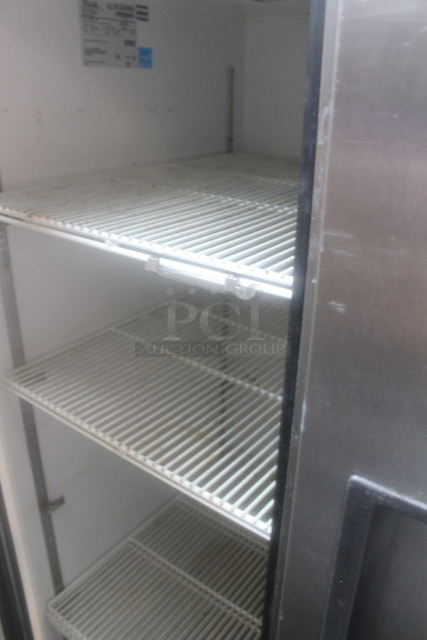 2014 True TG2R-2S ENERGY STAR Stainless Steel Commercial Two Door Reach In Cooler w/ Poly Coated Racks on Commercial Casters. 115 Volts, 1 Phase. Tested and Working! - Image 3 of 5