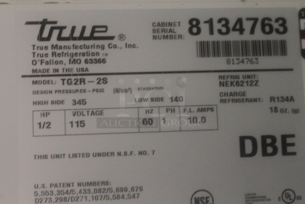 2014 True TG2R-2S ENERGY STAR Stainless Steel Commercial Two Door Reach In Cooler w/ Poly Coated Racks on Commercial Casters. 115 Volts, 1 Phase. Tested and Working! - Image 5 of 5