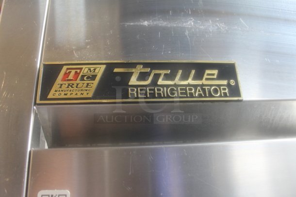 2012 True TG2R-2S ENERGY STAR Stainless Steel Commercial Two Door Reach In Cooler w/ Poly Coated Racks on Commercial Casters. 115 Volts, 1 Phase. Tested and Working! - Image 2 of 5