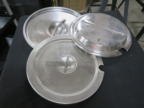Assorted Size Stainless Steel Lids. 3XBID