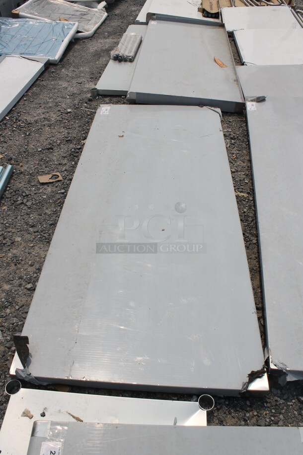 BRAND NEW SCRATCH AND DENT! Regency 600FWT3072 Commercial Stainless Steel Open Base Folding Work Table - Image 3 of 4