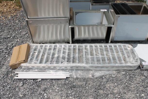 BRAND NEW SCRATCH AND DENT! Regency 109APR1826L Commercial Stainless Steel Unassembled Sheet Pan Rack. - Image 1 of 7