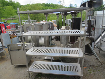 One Stainless Steel Shelving System With 4 Shelves. 60X20X77
