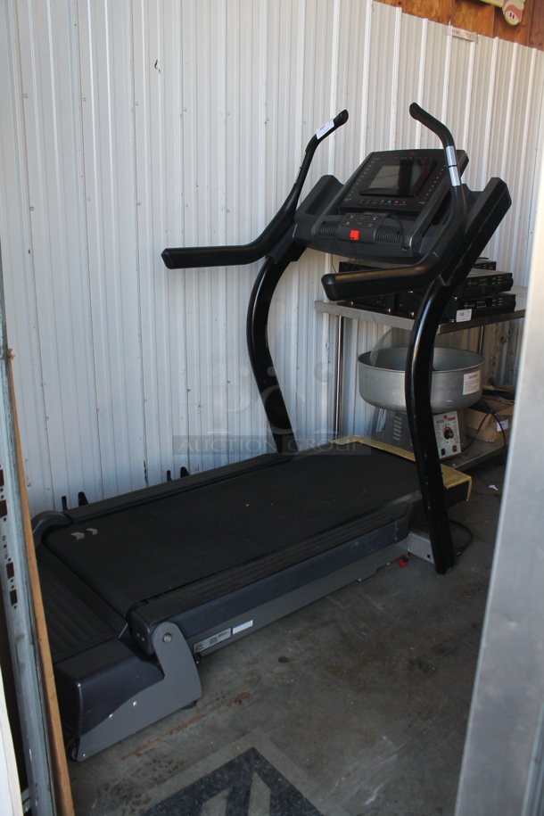 Freemotion FMTK74810.7 i11.9 Incline Trainer Metal Commercial Floor Style Treadmill. 110-120 Volts, 1 Phase. Tested and Powers On But Screen Does Not Work - Image 1 of 5