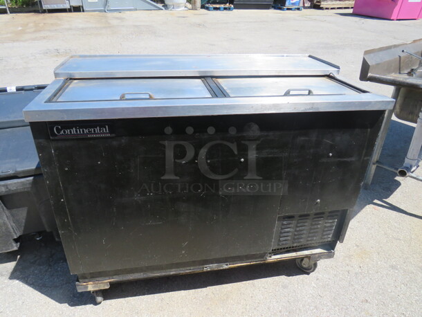 One 2 Door Continental Bottle Box On Casters. Model# CBC50. 115 Volt. 50X28X42