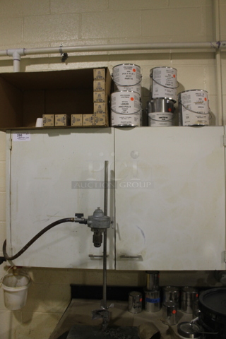 White 2 Door Cabinet w/ Contents Including Liquid Propoly. BUYER MUST REMOVE.