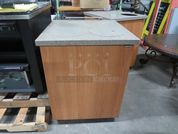 One Brown Laminate 1 Door Trash Receptacle  With Granite Look Top, On Casters, And 2 Slim Jim Trash Cans.  - Image 1 of 3