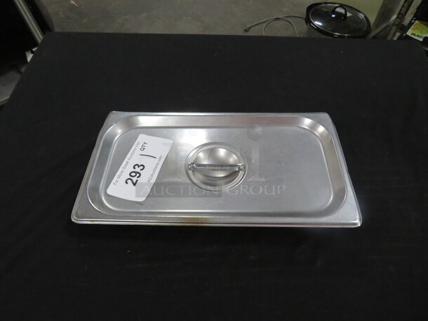 One 1/3 Size Stainless Hotel Lid.