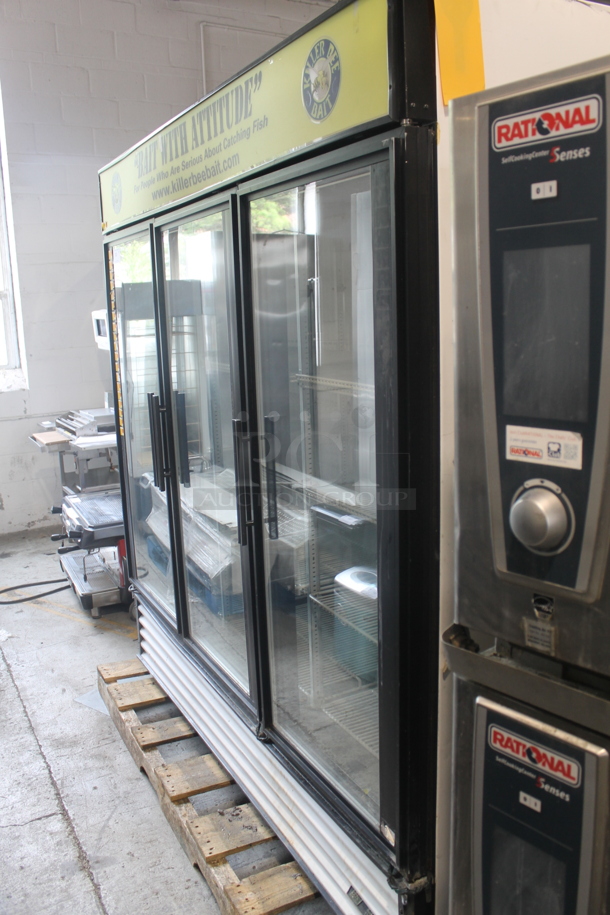 2012 True GDM-72F Commercial Three Swing Door Merchandiser Freezer With Polycoated Racks. 115/208-230V, 1 Phase.  - Image 3 of 7