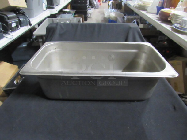 One 1/3 Size 4 Inch Deep Hotel Pan. 