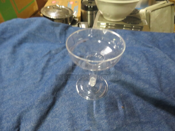 One Lot Of NEW Plastic 4oz Champagne Cups.