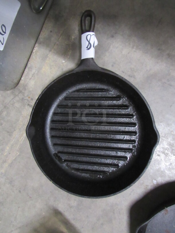 One 11 Inch Cast Iron Skillet.