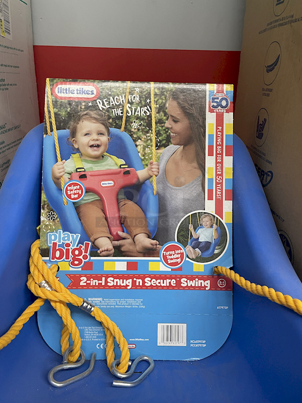 MASSIVE LOT! (3) Little Tikes 2-In-1 Snug & Secure Swings – 1 Blue, 2 Pink; (17) Nuby Water Resistant Baby Bibs (assorted colors); (1) Graco “Caden Fashion” Comfy Cruiser™ Travel System With Snugride® 30; (1) Allen YOOGO CZ2 Convertible Cargo Trailer → Handy Pull Cart,  (1) Delta Children Sweet Slumber Bassinet, (1) Chicco LullaGo Portable Bassinet, (1) Chicco NextFit Sport Convertible Car Seat, (2) Evenflo Omni Plus Modular Travel System – Includes LITEMAX Rear-Facing Infant Car Seat, (1) Baby Trend EZ Ride Girl 35 - Includes NEW 4-35 Ibs Infant Car Seat , (1) Evenflo Nurture Infant Car Seat Base. 11x Your Bid - Image 2 of 12