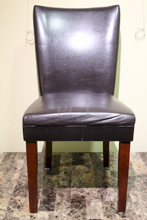 Set of (2) Burgundy Padded Chairs. 19x19x36. 3x Your Bid.