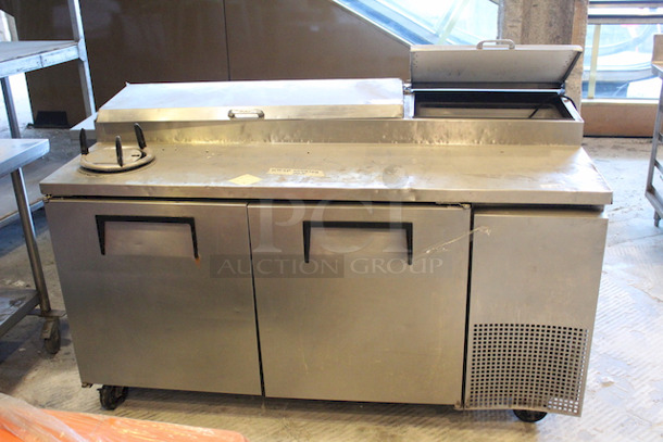 OUTSTANDING!! True TPP-67 67" Pizza Prep Table w/ Refrigerated Base, 115v, On Commercial Casters. 
Tested. Turned On. Got Cold.
67-1/4x32-1/2x42  115 V, 60 Hz, 1 ph - Image 1 of 5