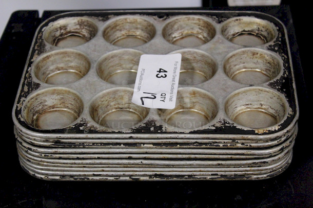 AWESOME! 12 Hole Muffin Pans. Muffin Hole Measurements 2-1/2”x1”. OA 13x10x1 12x Your Bid - Image 1 of 1